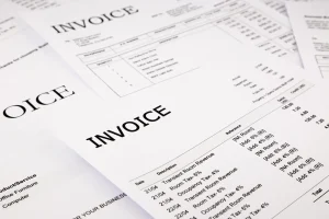 close-up difference invoices and bills, document and paperwork